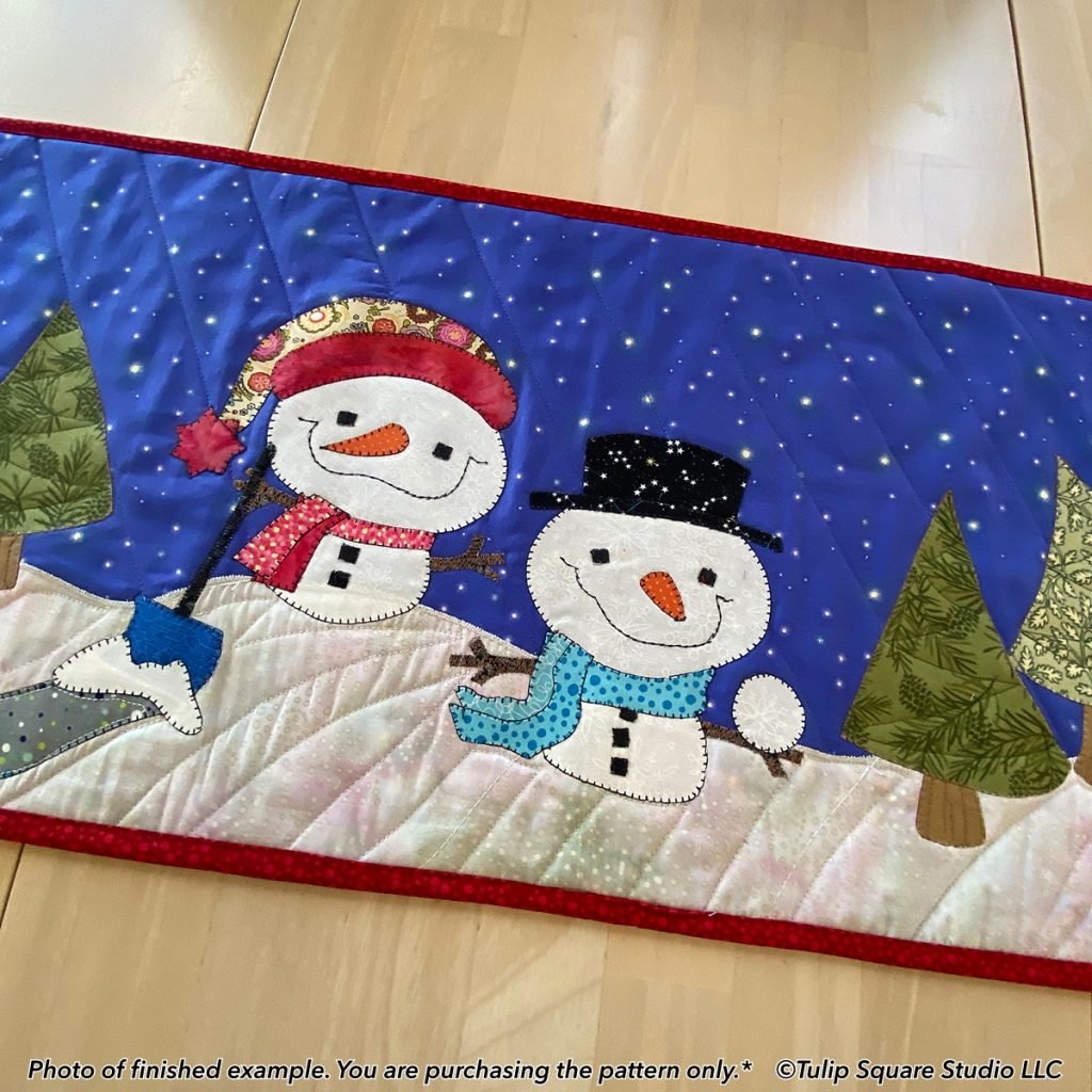 two cute snowman winter appliqué patterns - placemats and table